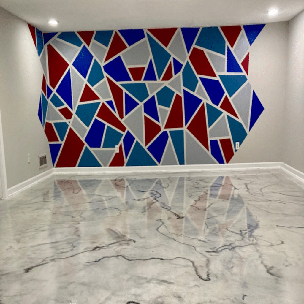 Our Work - Photo of a metallic marble epoxy floor indoors featuring a shiny, high-gloss finish with a unique and stylish metallic marble pattern that provides a durable and aesthetically pleasing option for homeowners to enjoy.