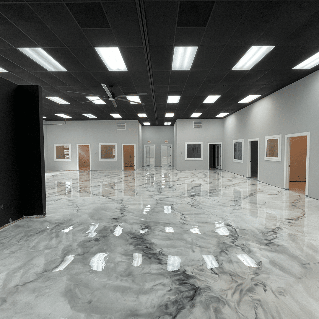 Our Work - Photo of an indoor metallic marble epoxy floor, featuring a high-gloss finish and a unique metallic marble pattern that provides a durable, low-maintenance, and aesthetically pleasing option for homeowners or businesses.