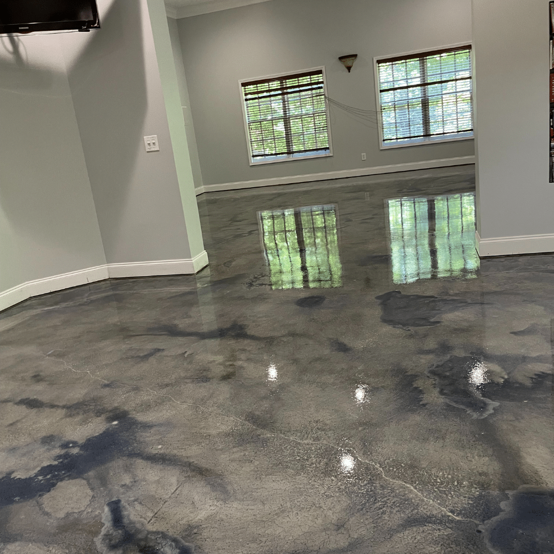Photo of a metallic marble epoxy floor indoors, featuring a unique and luxurious flooring solution that provides a durable, low-maintenance, and aesthetically pleasing option for any indoor space.