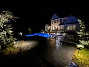 Our Work - Residential pool deck coatings at night